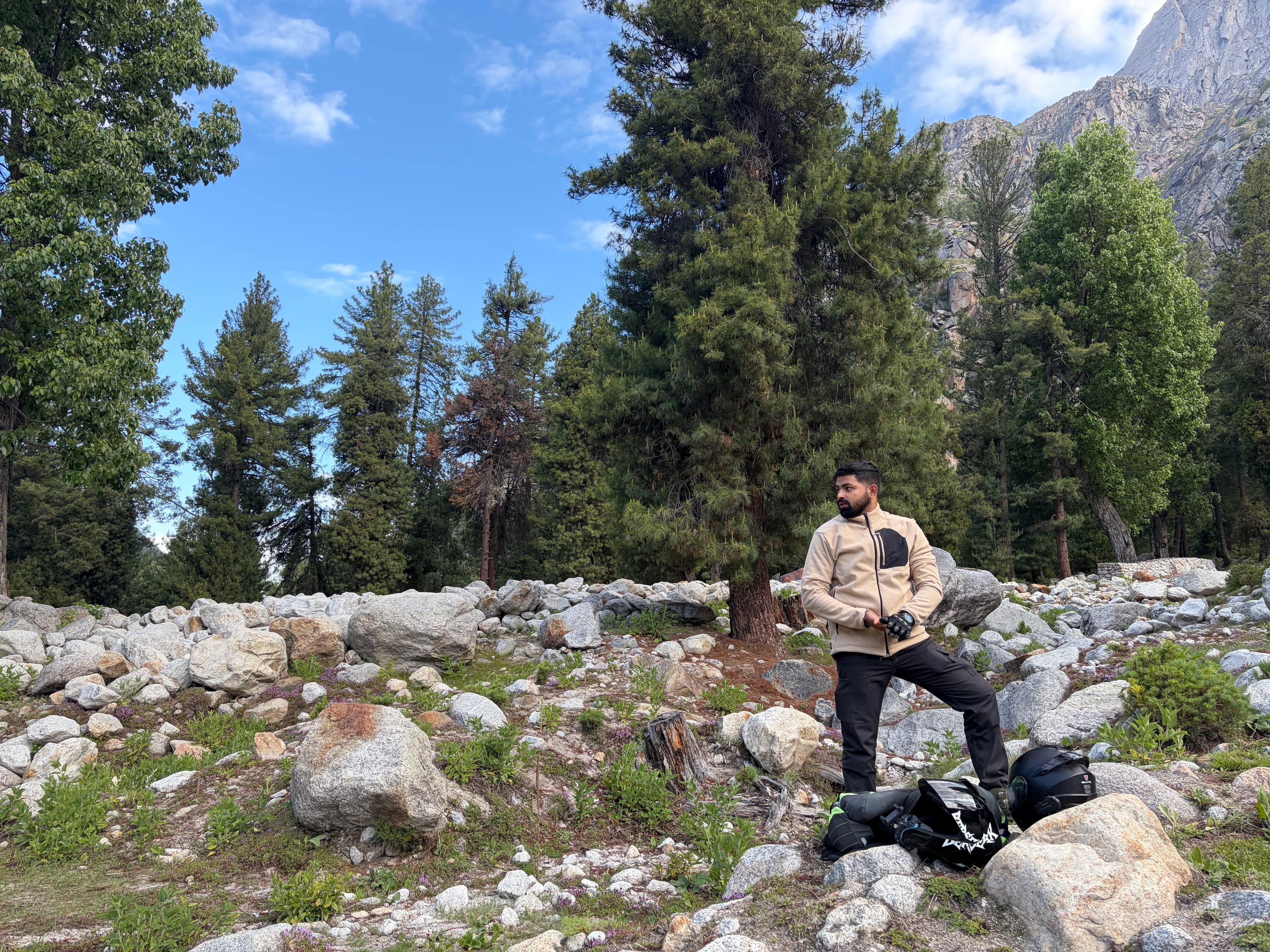 Standing among the rocks and trees near Chitkul